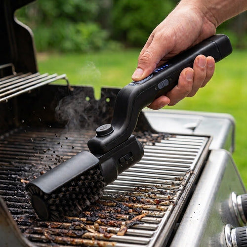 Grill.Zero electric grill brush cleaning a greasy BBQ grate, leaving a clean shiny strip